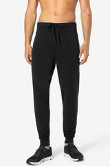 super.natural Everyday miesten merinovillaiset housut, Jet Black